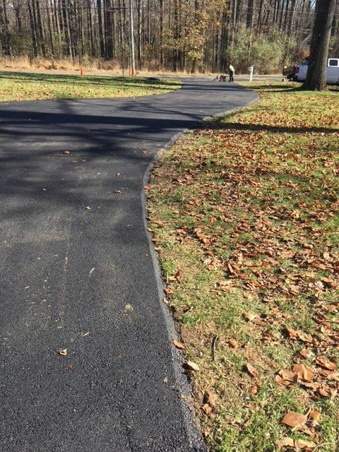 A Guide to Asphalt Paving: Tips for Long-Lasting Driveways and Parking Lots